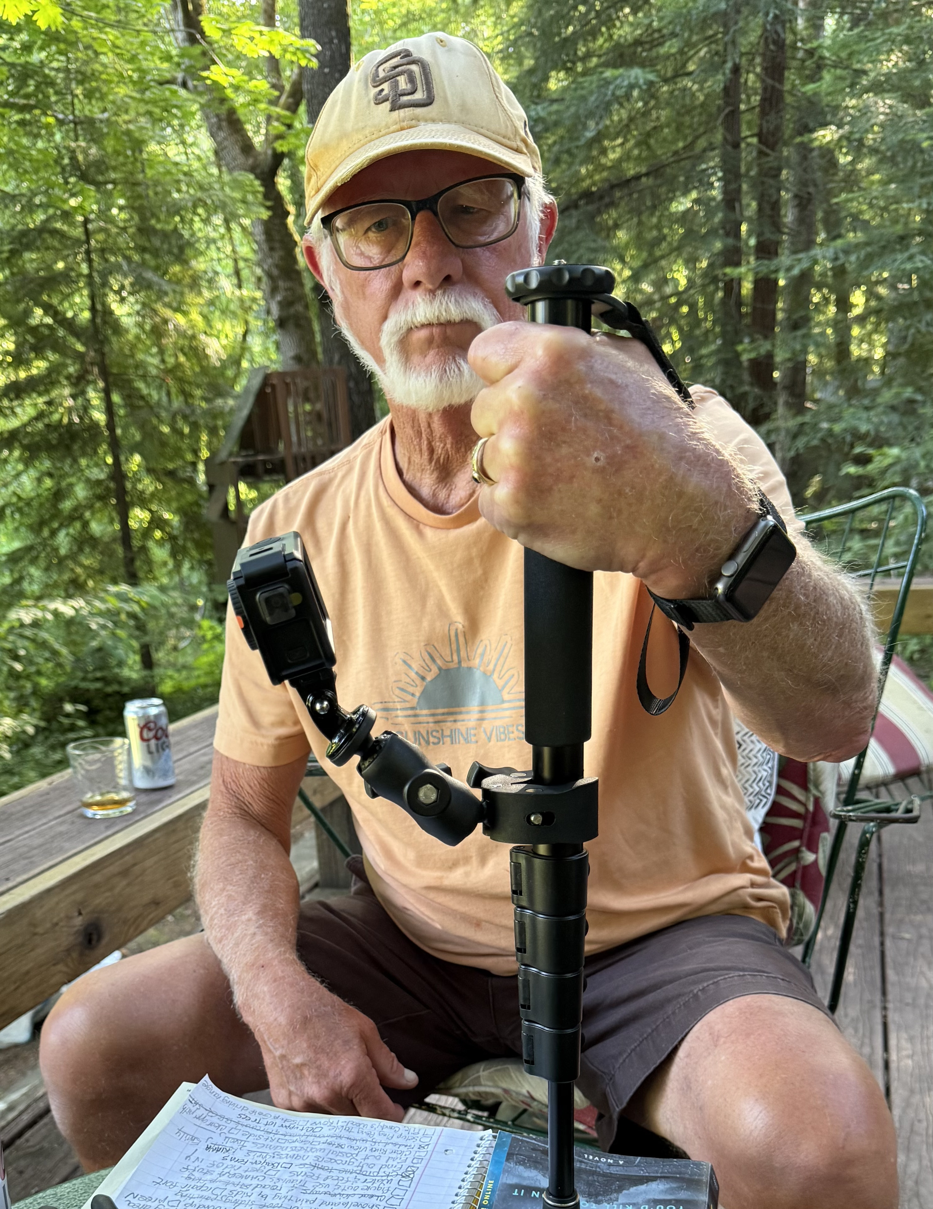 Travis's dad wading into the Eel River to collect underwater footage for Current Sight